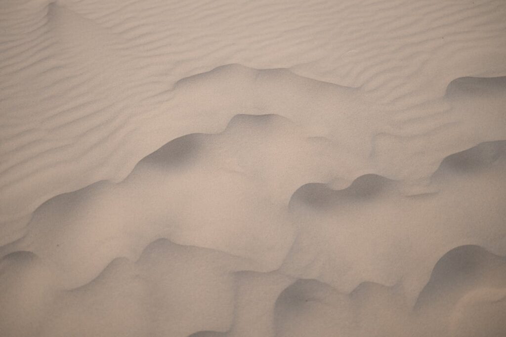 Close-up of sand dunes with textures in Samalayuca, Mexico's desert.